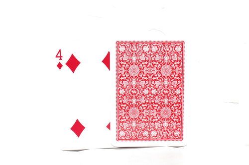 2 Card Monte magic trick — gaffed card showing the red back and four of diamonds face.