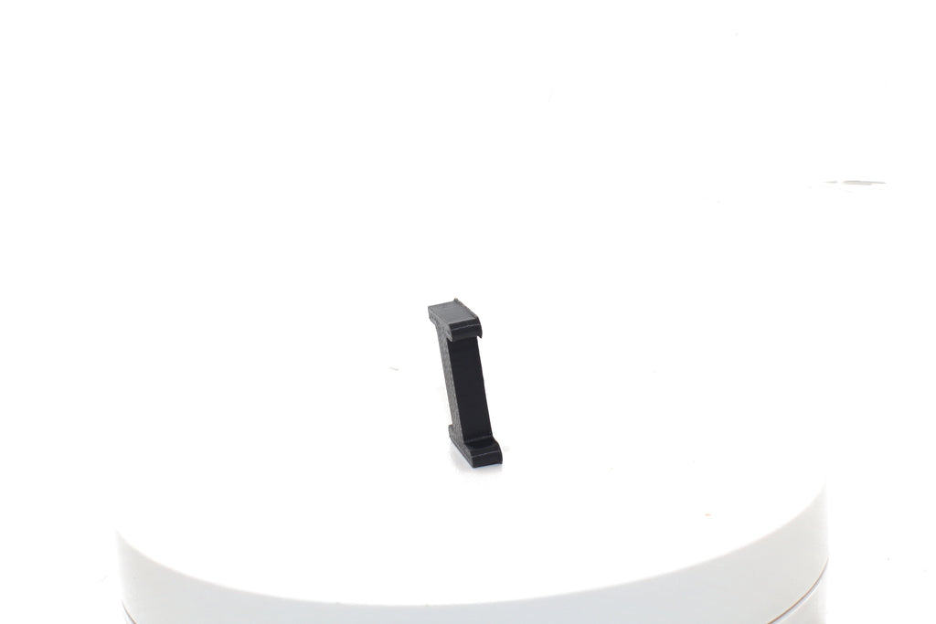 Black Eye small prop viewed from the side, showing its 3D-printed profile.
