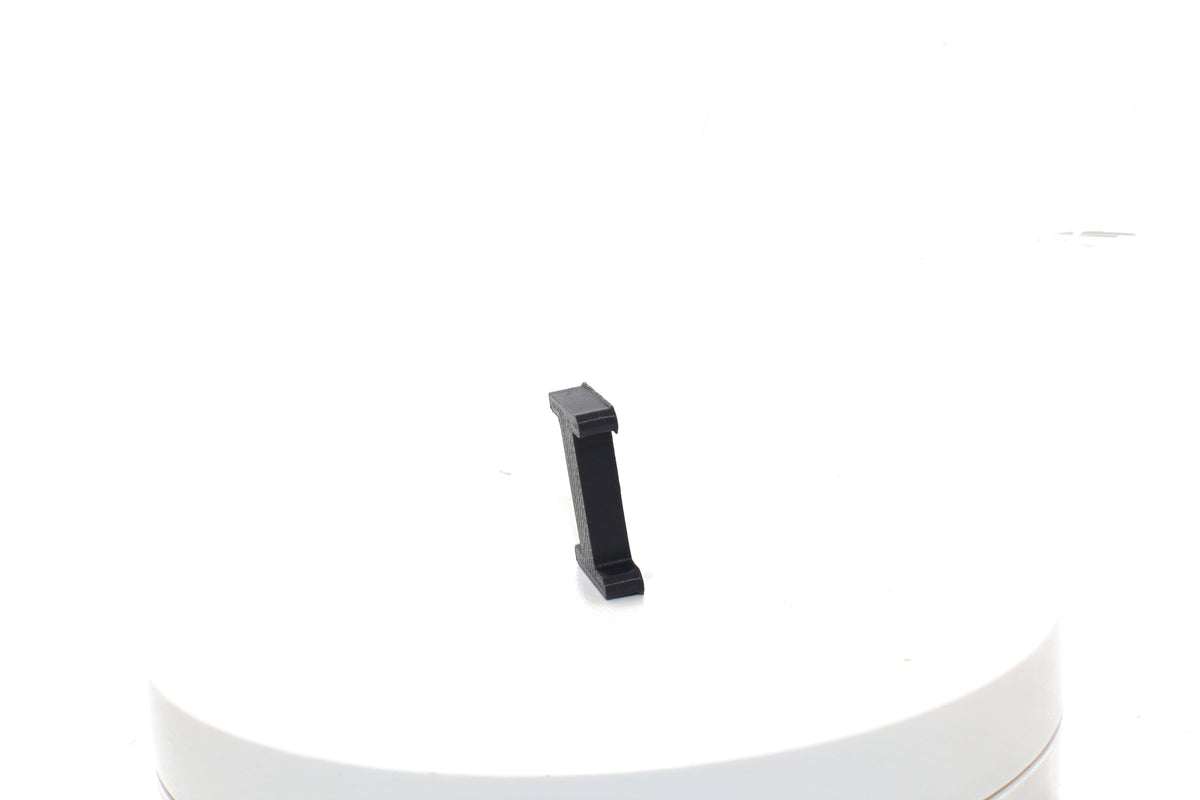 Black Eye small prop viewed from the side, showing its 3D-printed profile.