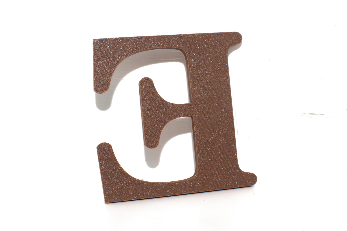 Brown E large prop, textured brown finish on a clean white background.