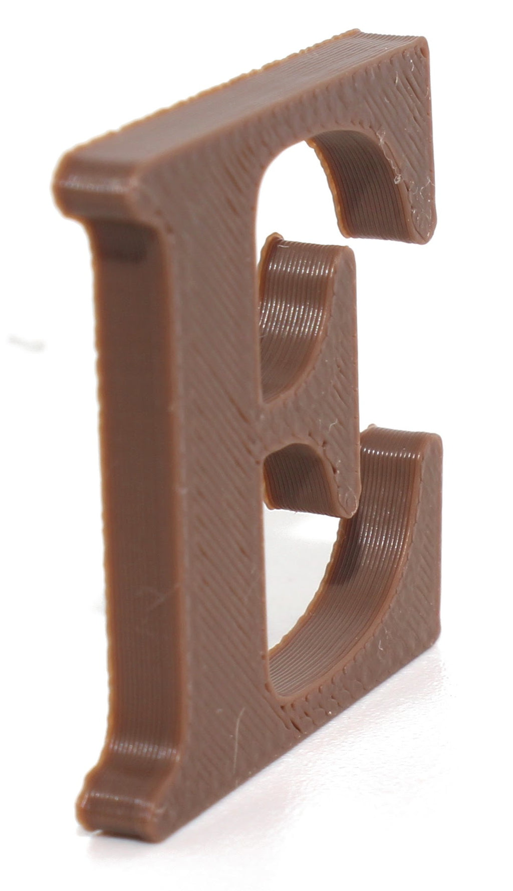 Brown E small prop showing the layered filament texture close up.