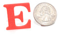 Red E pun prop, small size, shown beside a US quarter for scale.