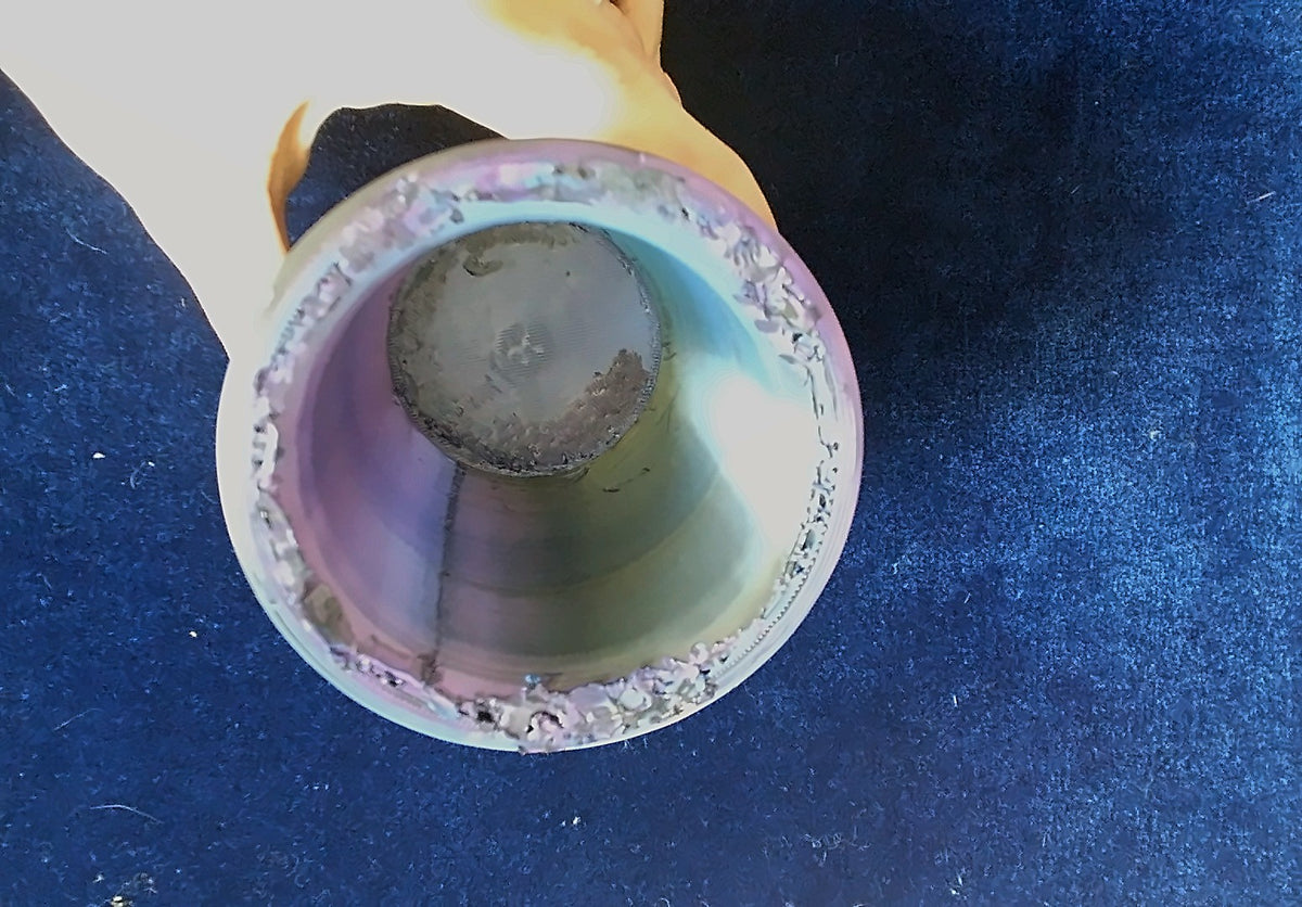 Looking inside the Chop Cup, showing the rough rim and inner base