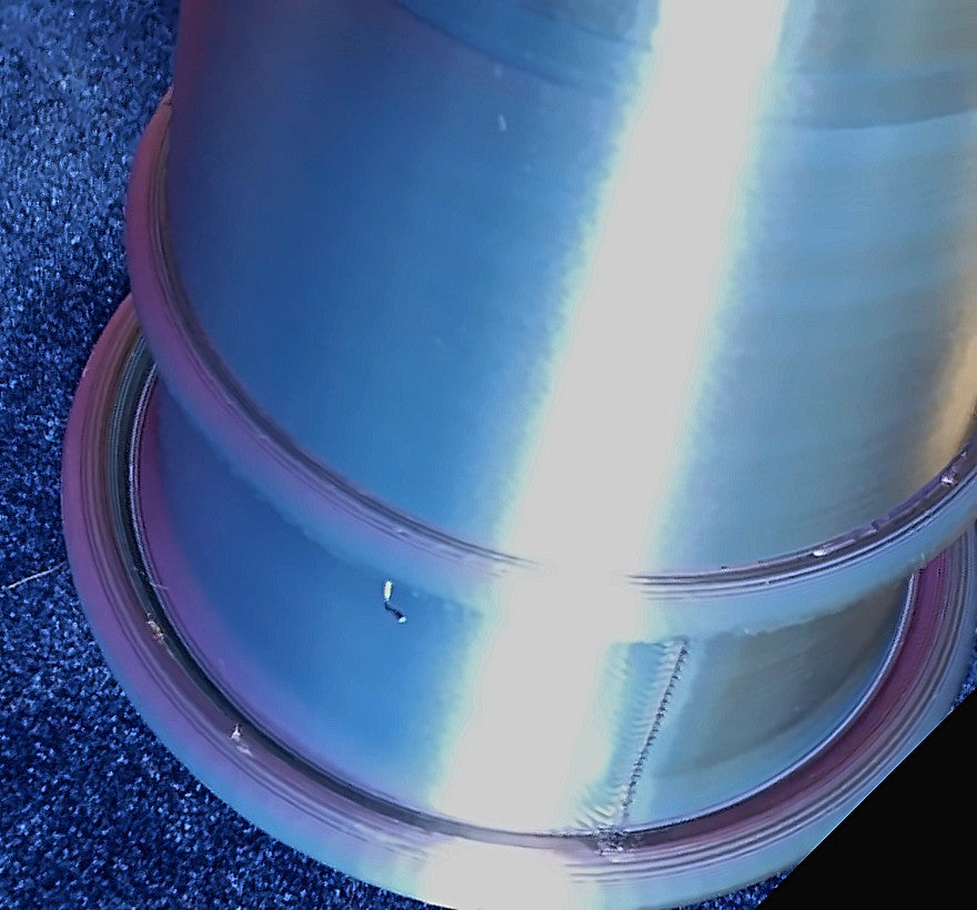 Close-up of a Chop Cup's lower body showing a small mark and seam line